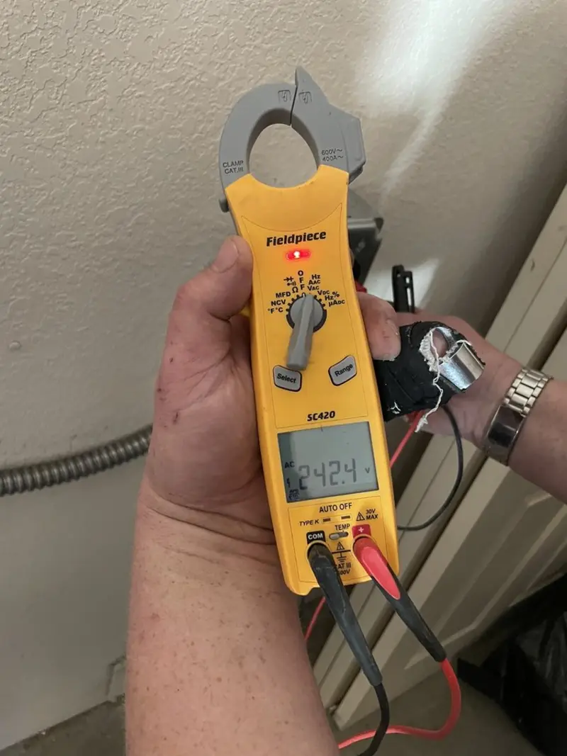 Voltage testing with clamp meter during Outlet Installation in Centreville